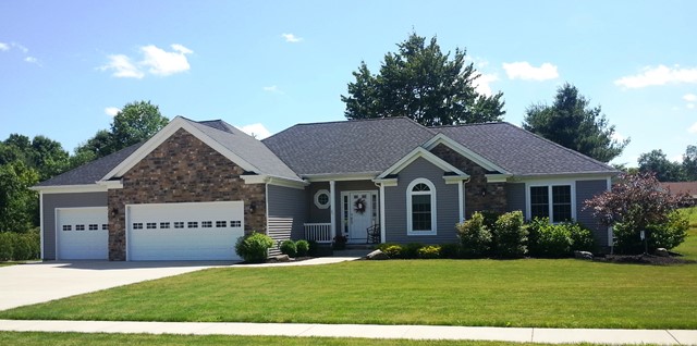 Vaulted/cathedral foyer and great room with corner fireplace. Kitchen with walk-in pantry, large island/breakfast bar, built-in desk, and bayed dining area. 1st floor laundry/mud room. Master bedroom with optional cathedral ceiling. Master bath with double sinks, separate shower, and corner garden tub. Bedroom #4 with optional cathedral ceiling- can also be formal dining room/parlor/den. Covered front porch. 2-car garage.