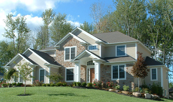 1st floor master suite with large vaulted master bath. 2 story foyer and great room with bridge between. 1st floor office/den. Formal dining room or parlor with tray ceiling. Loft overlooking foyer and great room. 1st floor laundry. Arched
