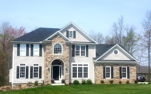 9' ceilings on first floor. Large great room with columns. 2-story foyer with large plant ledge. 1st floor parlor/den with french doors. Formal dining room with columns and gas or wood-burning fireplace. Large kitchen with walk-in pantry and breakfast bar/island. Large double tray ceiling in master suite with large walk-in closet and glamour bath with optional walk-in tile shower. 1st floor mud room. 2nd floor laundry. 2-car side entry garage (3-car optional).